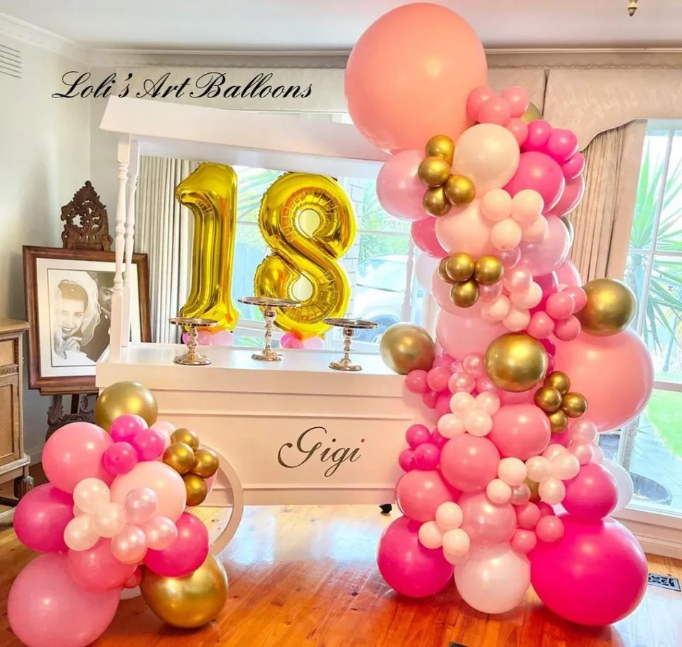 Birthday celebration with a coordinated party backdrop and decorations